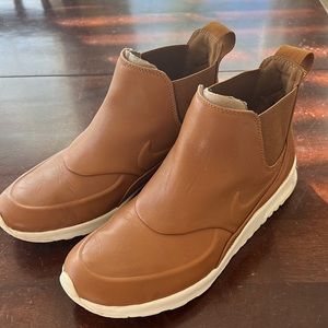 Nike waterproof slip on sneakers.